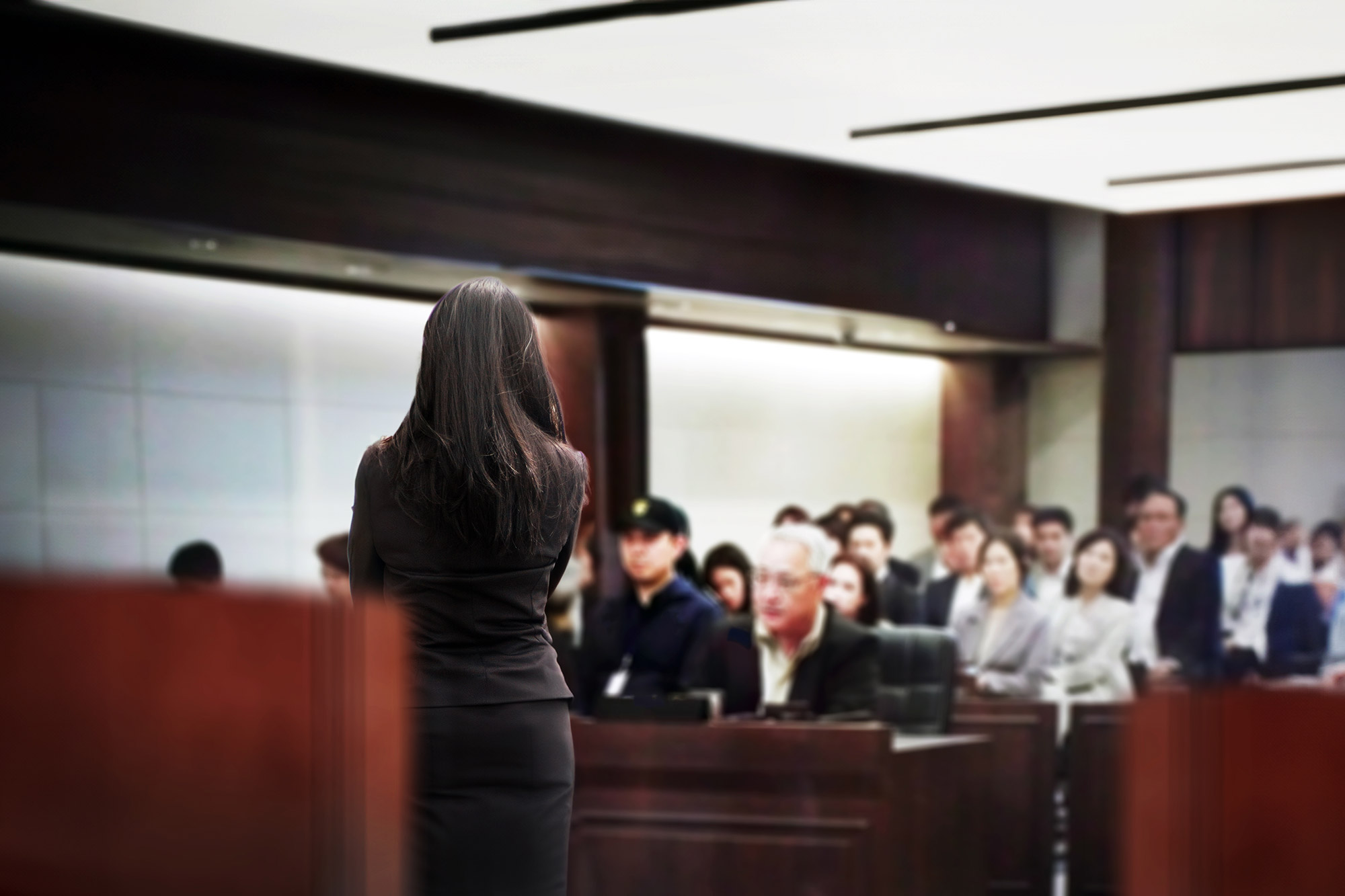 A lawyer defending her client in a probation violation case in a Michigan courtroom.